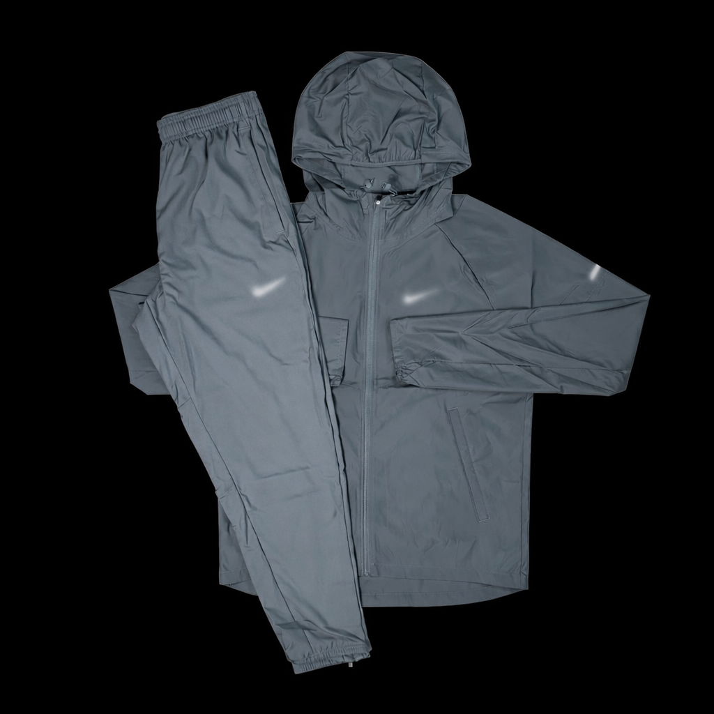 Gray Nike Milers tracksuit by Theplugcrew, featuring comfortable fabric and sporty design for active wear.