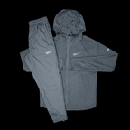 Gray Nike Milers tracksuit by Theplugcrew, featuring comfortable fabric and sporty design for active wear.